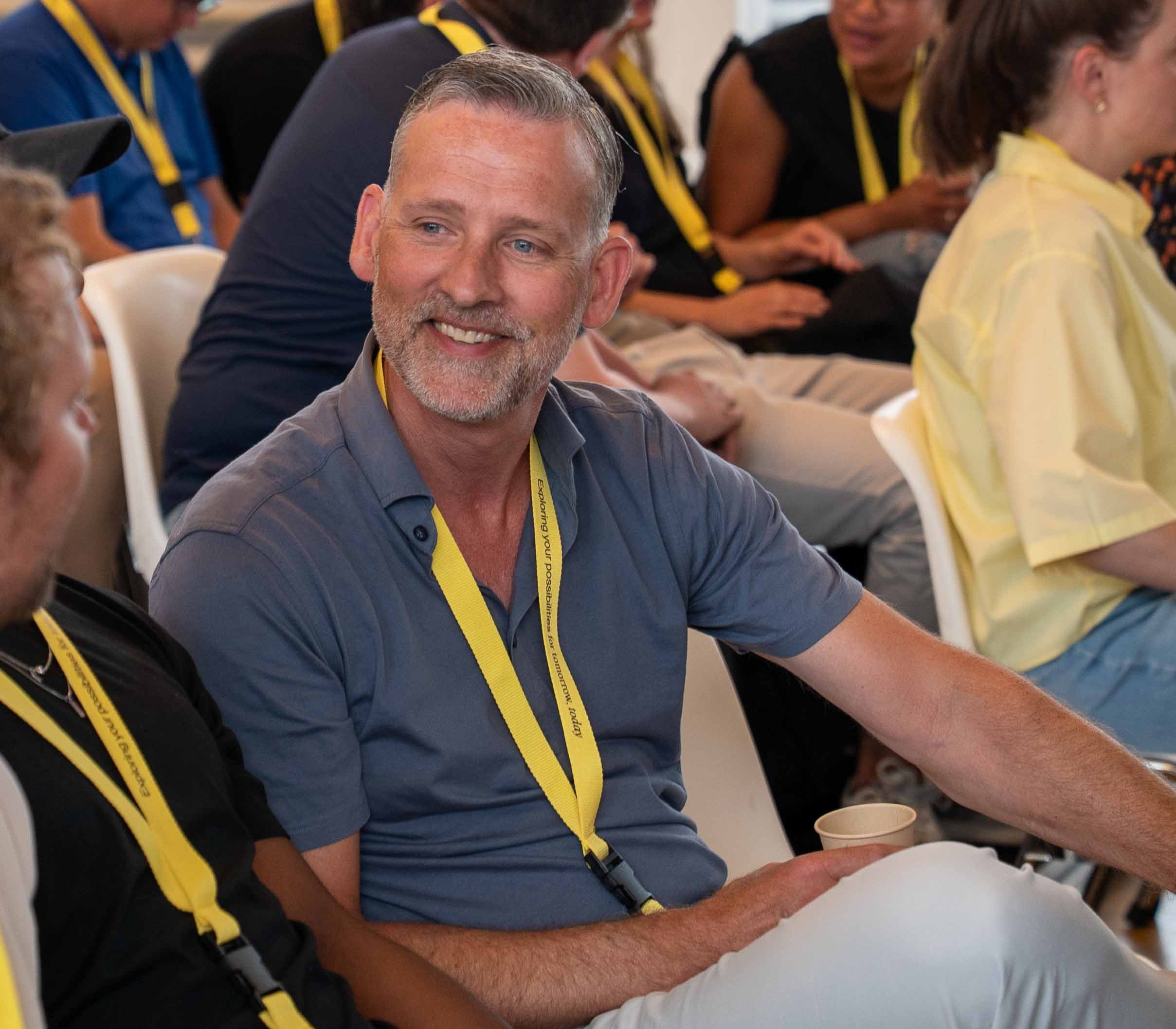 Marko in conference room larger cropped_small size